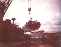 Crane lifting the Alpha Boat