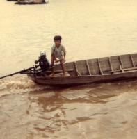 Typical sampan with outboard motor